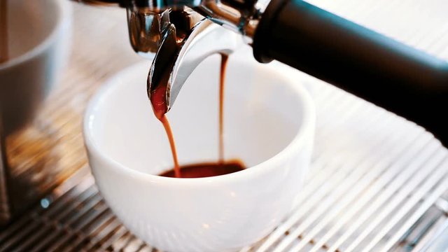 pouring coffee.coffee machine.