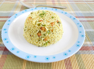 Indian food raw mango rice, which is a traditional and popular dish, is especially made on the festival day of Ugadi.