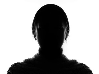 Hidden face in the shadow.Female silhouette.