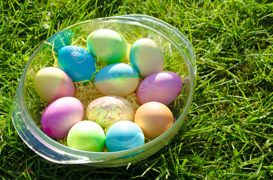 Bowl of Easter Eggs / A bowl of Easter eggs with colorful art and bunny paintings.
