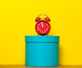 box and clock on the table