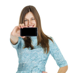 Fototapeta premium Young beautiful woman taking selfie with mobile phone