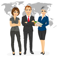successful professional business team standing with arms folded in front of an earth map
