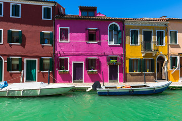 Fototapeta na wymiar Canal and colorful buildings in Burano island, Venice, Italy