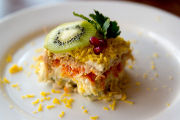 Salad with kiwi and pomegranate