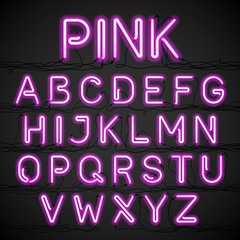 Pink neon light alphabet with cable