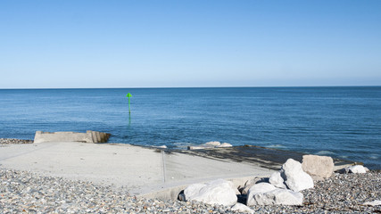 Concrete landing stage with beacon in Wales UK