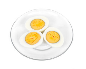 Boiled eggs on plate separated on white background
