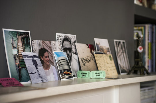 Living room mantelpiece with travel souvenirs and photographs