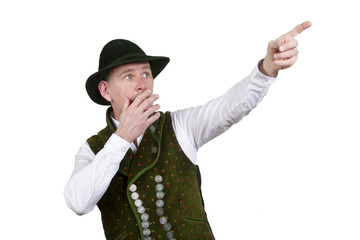 surprised bavarian man pointing at something