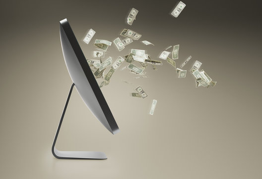 Still life with personal computer and floating dollar bills