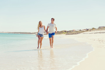 Romantic young couple on the beach