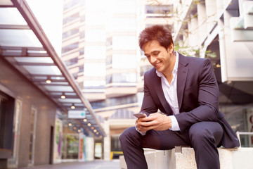 Fototapeta premium Portrait of confident businessman outdoors