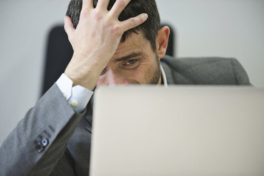 Young businessman looking stressed