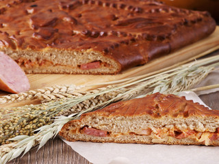 pie with sausages and cheese