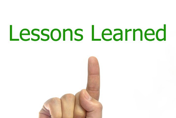 hand and finger showing lessons learned text. isolated on white background