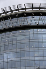 Fototapeta na wymiar Glass business center facade in a modern european city