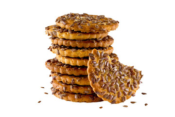 heap of cookies with flax seeds, isolate