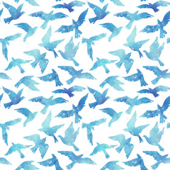 Fototapeta na wymiar Watercolor silhouettes of flying birds. Seamless pattern
