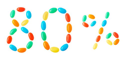 80% lettering made of multicolored candies isolated on white