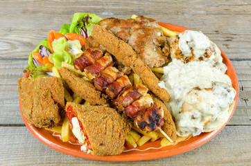 Large amount of miscellaneous Mixed fried meat with vegetables
