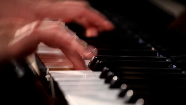 Woman Pianist Hands plays The Grand Piano. 