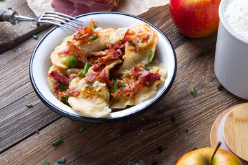 Polish fried dumplings with meat, onion and bacon.