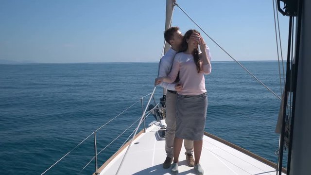 Romantic proposal scene on yacht