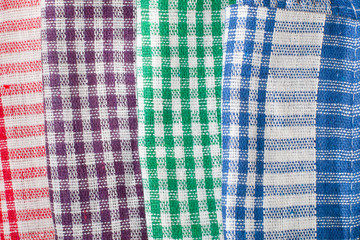 Four colored napkins as background.