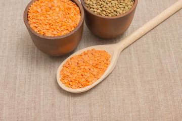 the seeds of red and green lentils on canvas