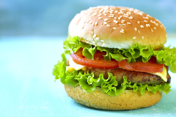 Burger with meat cutlet.