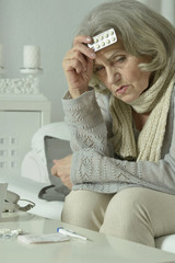 senior woman feel unwell