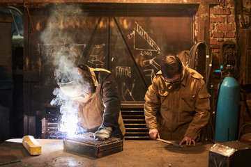Welding works in the workshop