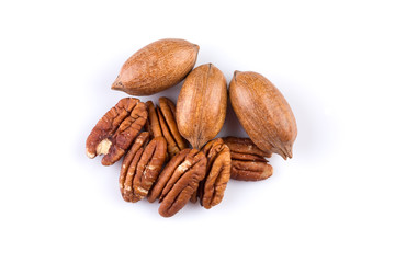 Few pecan nuts isolated on white