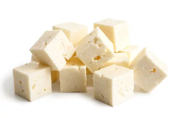 Rolgordijnen Square cubes of feta cheese isolated on white. © Moving Moment