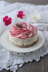 Fototapeta na wymiar cheesecake from cottage cheese with garlic and radish