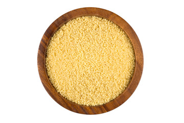 Raw couscous in a wooden bowl