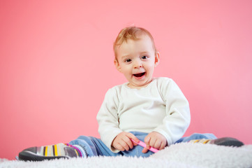 Happy baby with brown eyes