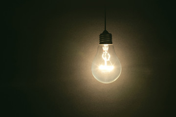 light bulb on dark background