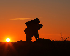 Man and woman climbing the mountain