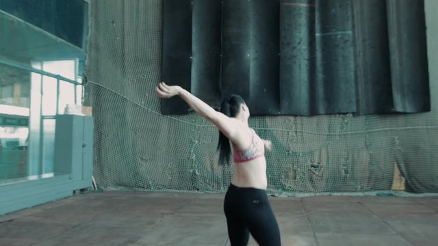 One caucasian sport female javelin, spear thrower prepares, and throw iron ball, grenade 