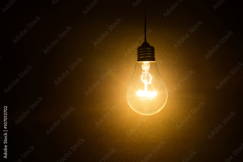 Poster light bulb on dark background