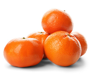 A pile of fresh tangerines isolated on white background, close up © Africa Studio