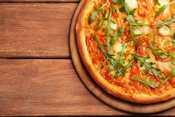 Margherita pizza with arugula on  background