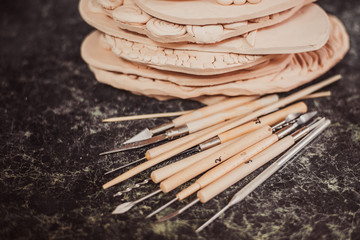 detail from pottery work room - brushes and tools
