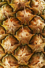 Naklejka na ściany i meble Pineapple background, closeup