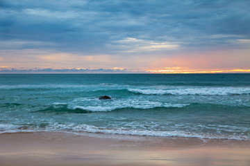 Tropical beach at sunset.