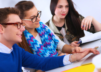 Young business people working at office on new project