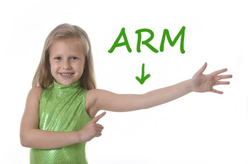cute little girl pointing her arm in body parts learning English words at school