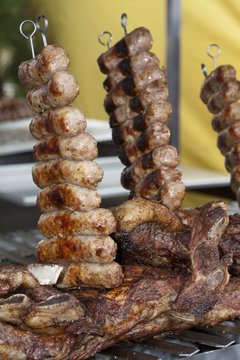 typical argentine meal cooked on grill with skewer